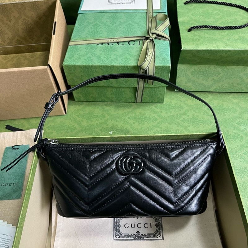 G*u*i top handle bags
